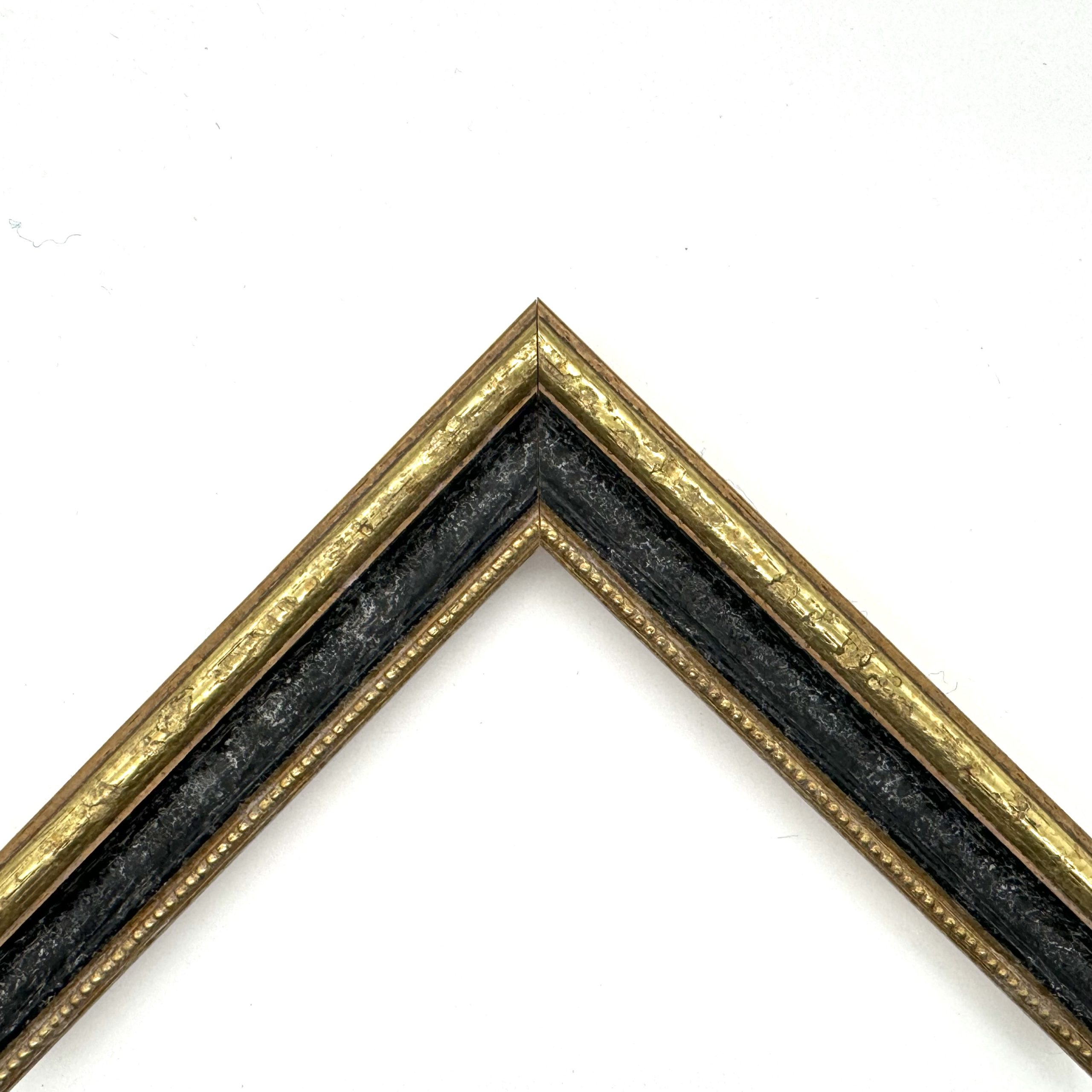 Cornice oro macchina pastellato nero-oro art. 549222